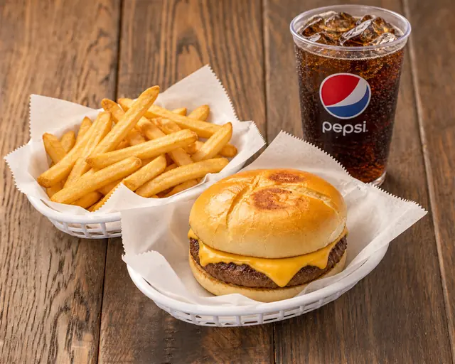 Cheeseburger meal with fries and a drink
